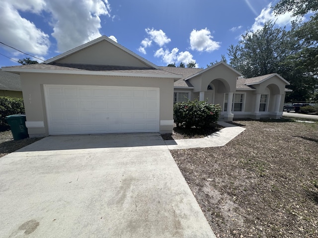 single story home with a garage