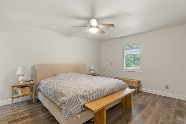 bedroom featuring ceiling fan and dark hardwood / wood-style floors