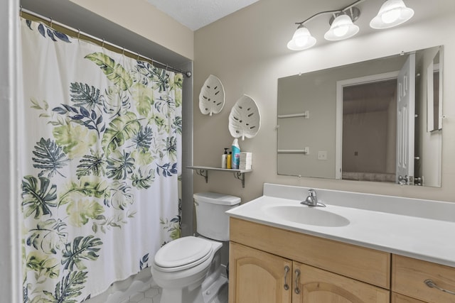 bathroom featuring a shower with curtain, tile patterned flooring, a textured ceiling, toilet, and vanity