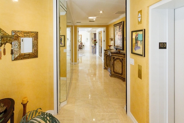 hallway featuring ornamental molding