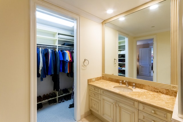 bathroom with vanity and crown molding