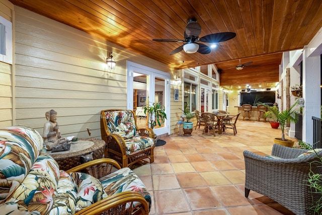 view of patio / terrace featuring french doors and ceiling fan