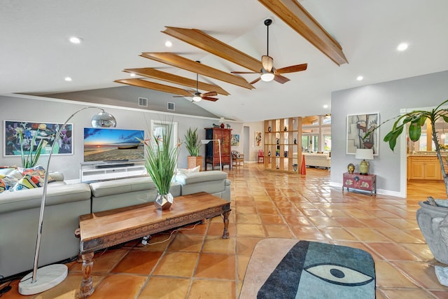 living room featuring light tile patterned flooring and lofted ceiling with beams