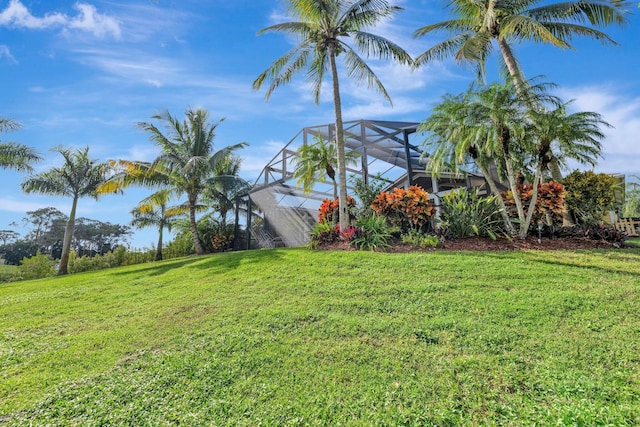 view of yard featuring a lanai