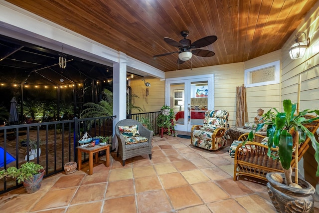 view of patio / terrace with french doors and ceiling fan