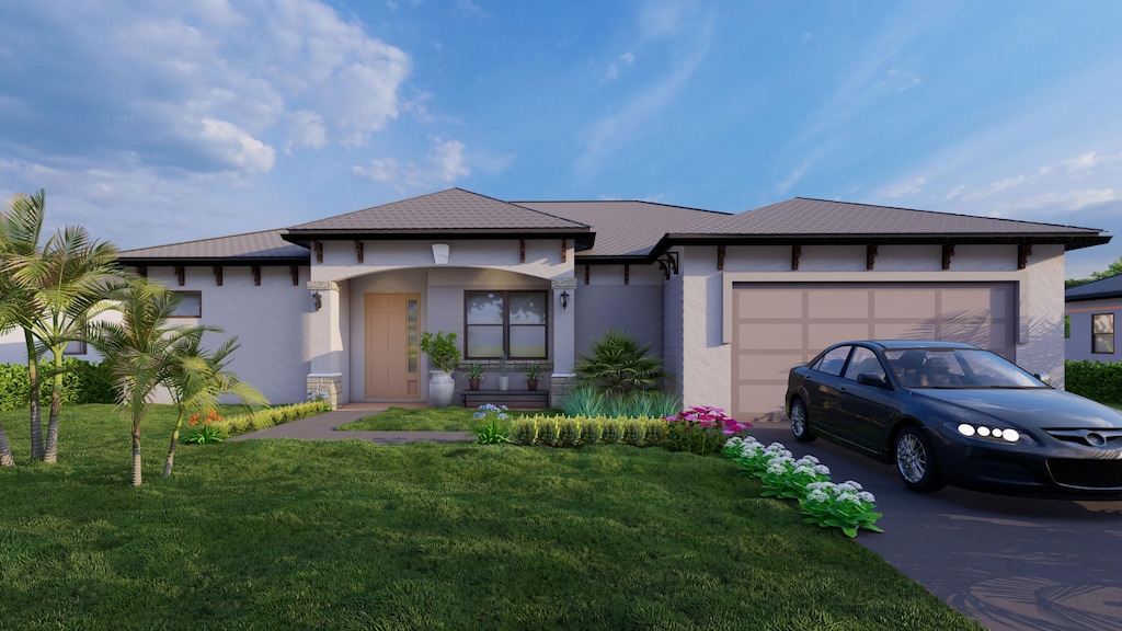 view of front facade with a front yard and a garage