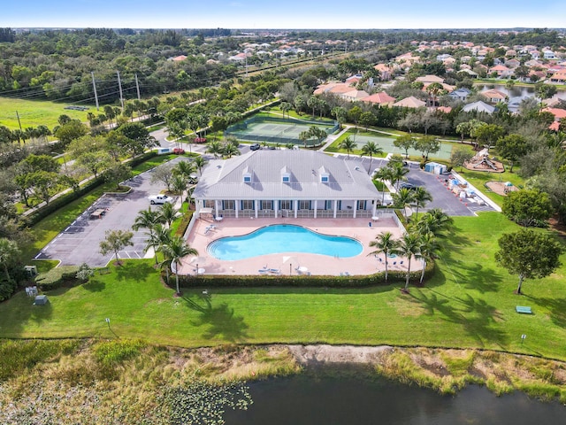 birds eye view of property featuring a water view