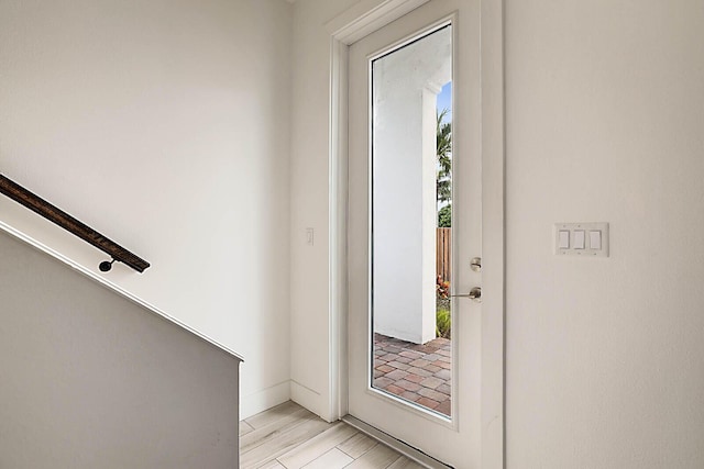 entryway with light wood-type flooring