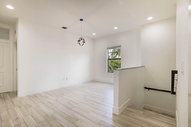 empty room featuring light hardwood / wood-style flooring