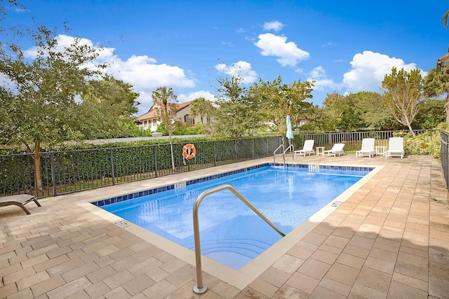 view of pool featuring a patio