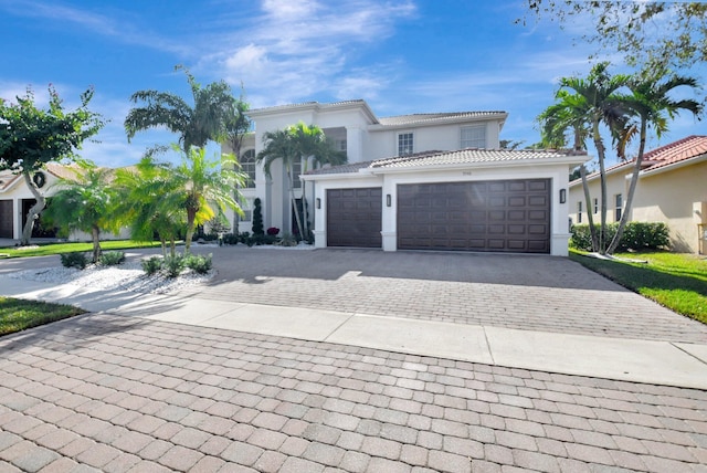 view of front of property with a garage