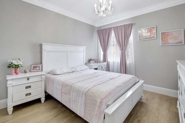 bedroom featuring a chandelier, light hardwood / wood-style floors, and ornamental molding