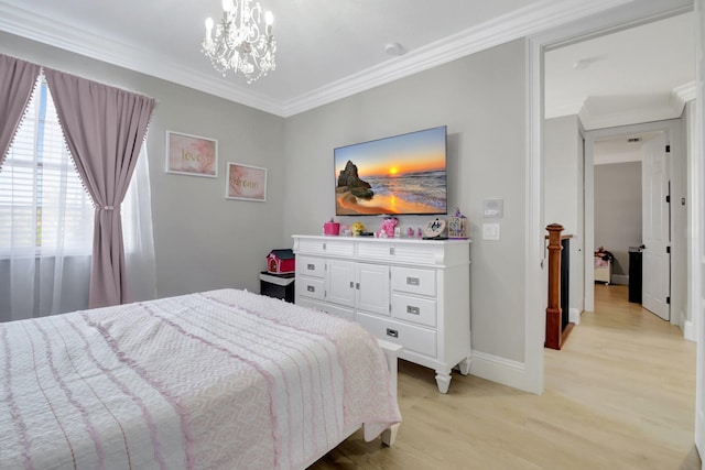 bedroom featuring light hardwood / wood-style flooring, a chandelier, and ornamental molding