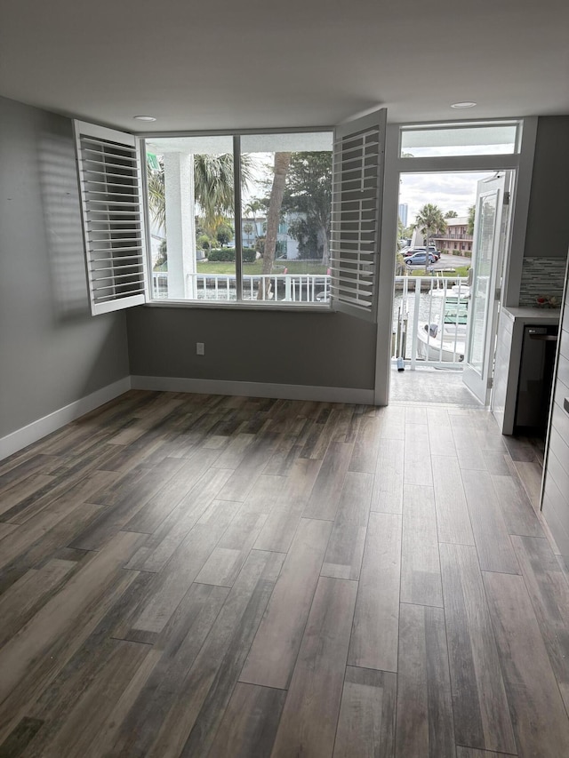 empty room featuring hardwood / wood-style flooring