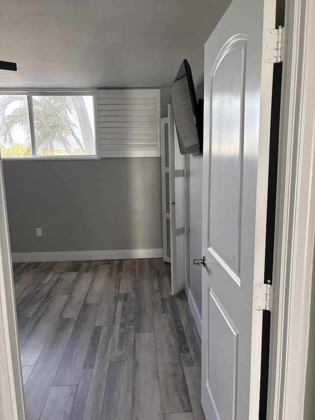 interior space with dark hardwood / wood-style floors