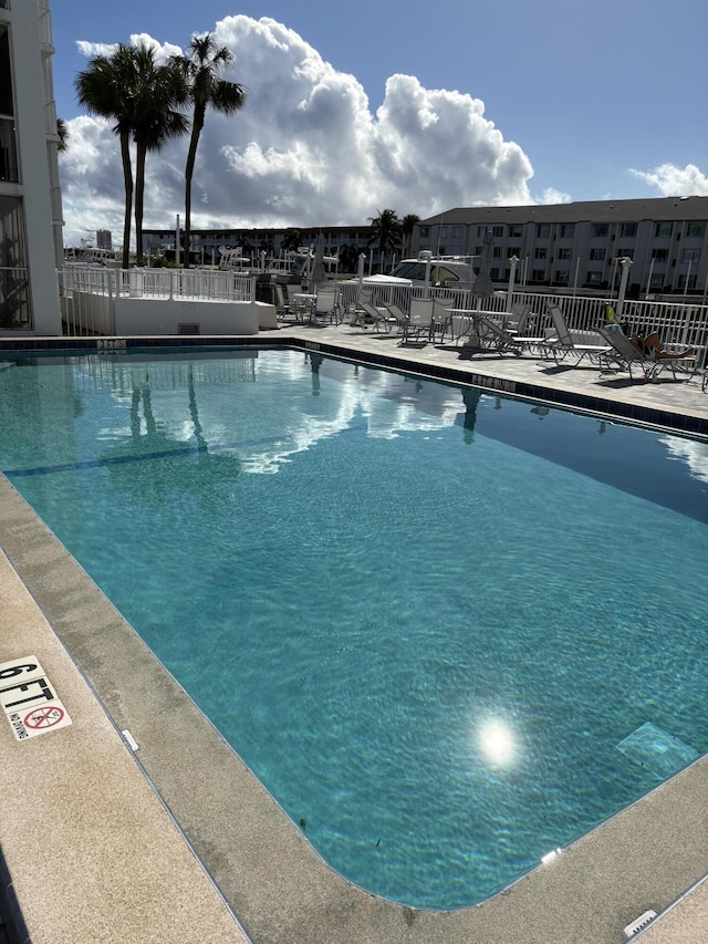 view of swimming pool with a patio