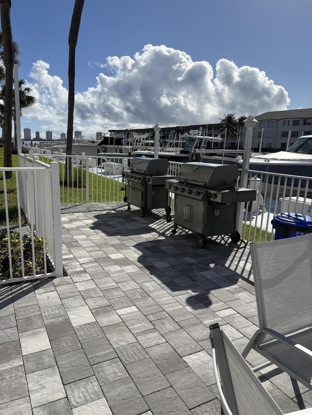 view of patio featuring a grill