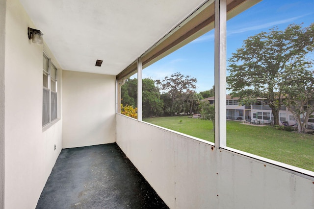 unfurnished sunroom featuring a healthy amount of sunlight