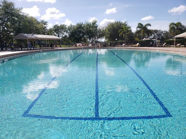 view of swimming pool with a gazebo