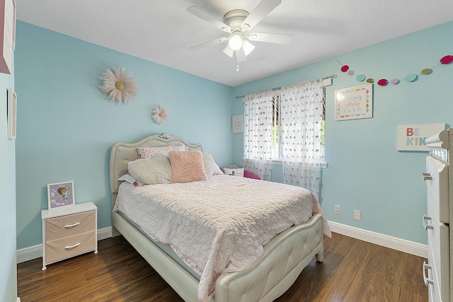 bedroom featuring dark hardwood / wood-style flooring and ceiling fan