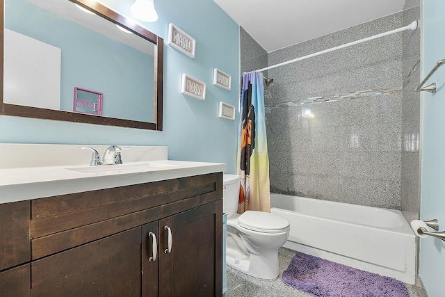 full bathroom with vanity, shower / bath combo, and toilet