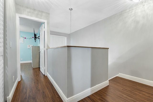 hall featuring dark hardwood / wood-style flooring