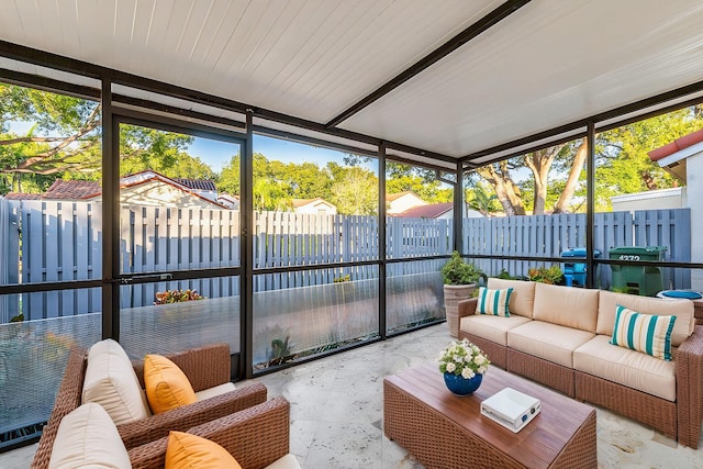 sunroom / solarium with a wealth of natural light