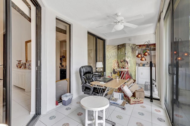 tiled office with ceiling fan and washing machine and clothes dryer