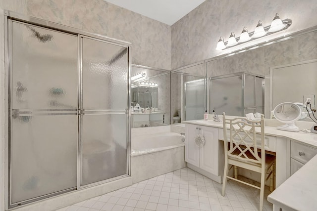 bathroom featuring tile patterned floors, vanity, and independent shower and bath