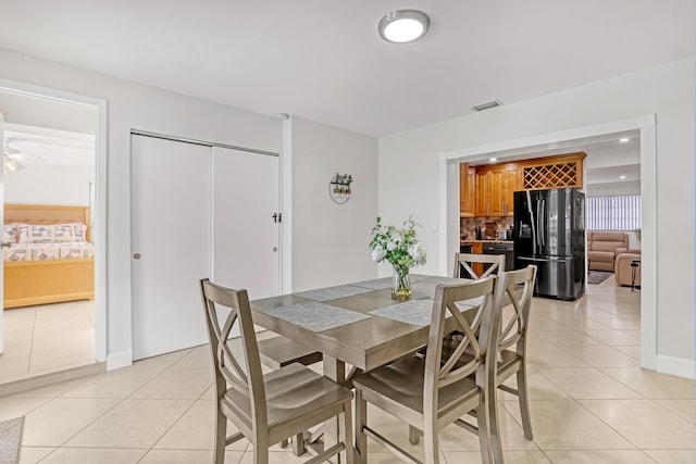 view of tiled dining space