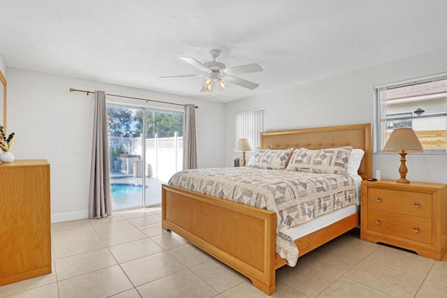 tiled bedroom featuring access to exterior and ceiling fan