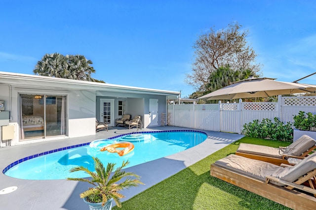 view of pool with a patio area