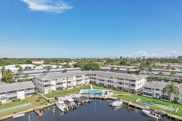 drone / aerial view with a water view