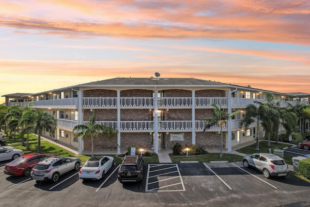 view of outdoor building at dusk