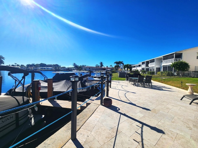 dock area featuring a water view