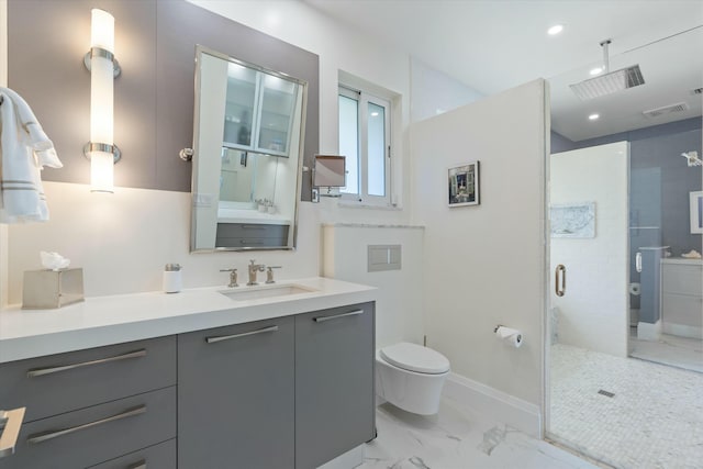 full bathroom with marble finish floor, visible vents, a stall shower, vanity, and baseboards