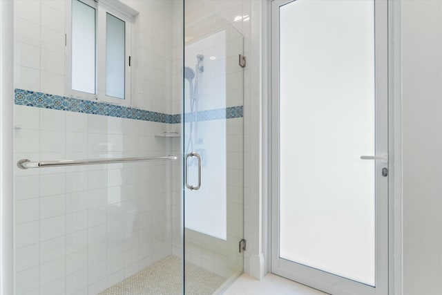 full bath featuring a stall shower