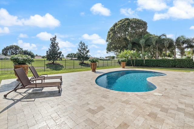 view of pool featuring fence, a fenced in pool, and a patio