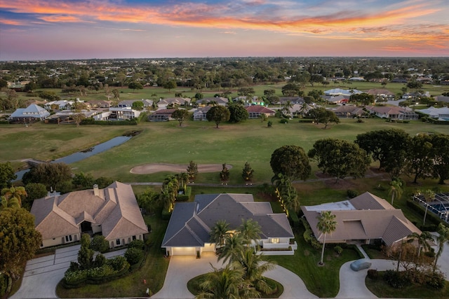 aerial view at dusk with a residential view