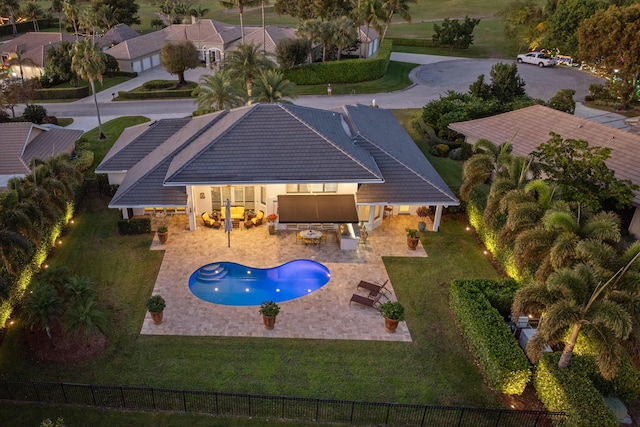 view of pool with a fenced in pool, a patio, a fenced backyard, a yard, and an outdoor living space