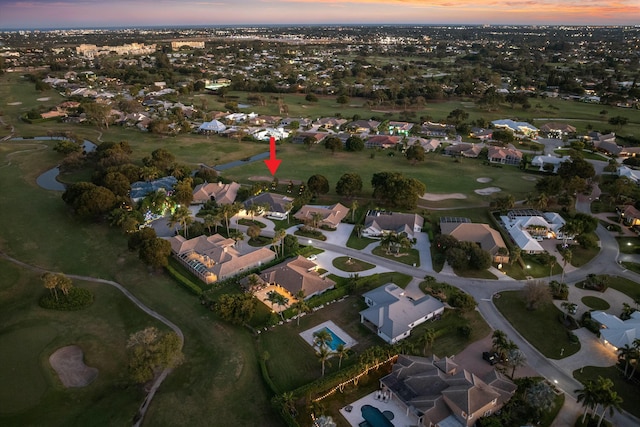 birds eye view of property with a residential view