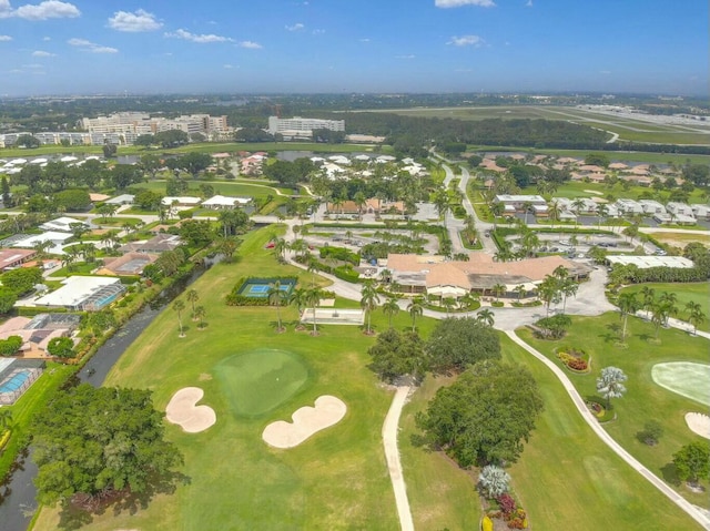 birds eye view of property featuring golf course view