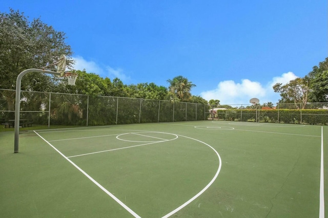 view of sport court with community basketball court and fence