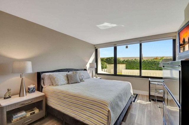 bedroom featuring light wood-type flooring