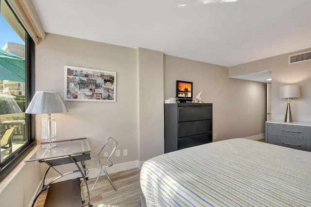 bedroom featuring light wood-type flooring