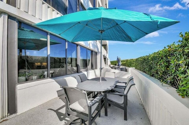 view of patio with a balcony