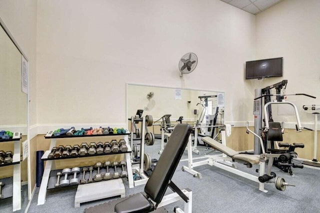 workout area with a paneled ceiling