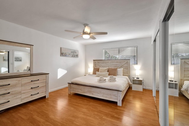 bedroom featuring wood-type flooring and ceiling fan