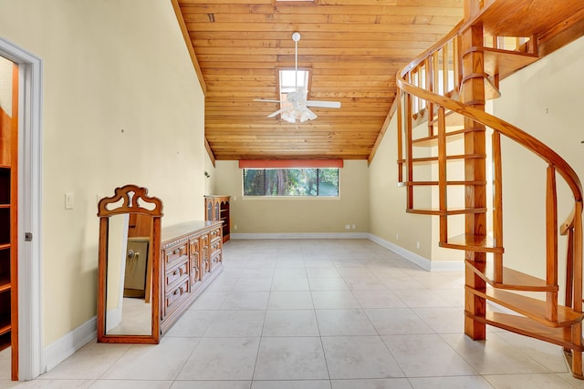 additional living space with ceiling fan, wooden ceiling, light tile patterned floors, and vaulted ceiling