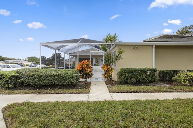 exterior space featuring a lanai